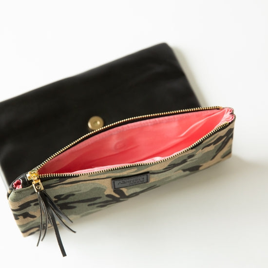 Pop the Clutch (available in camo and leopard print)
