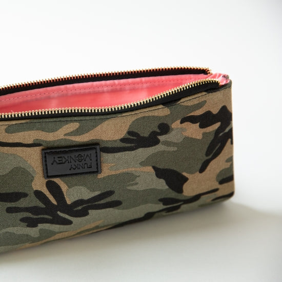 Pop the Clutch (available in camo and leopard print)